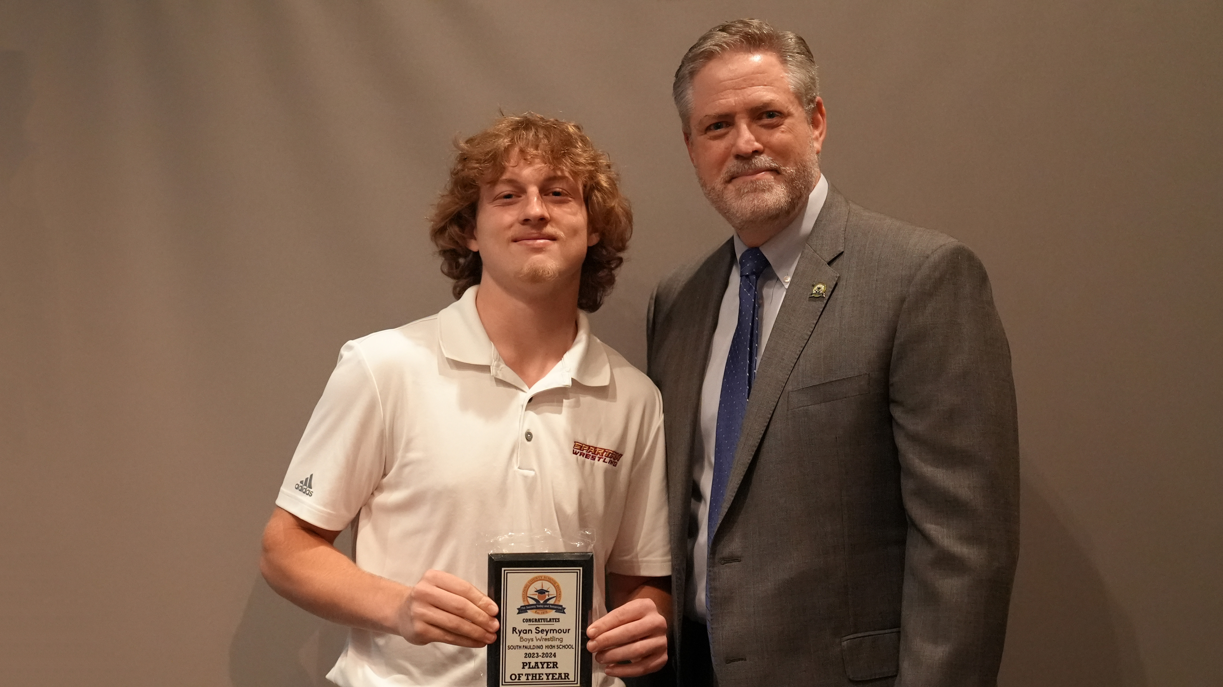 Superintendent Steve Barnette pictured with Winter Sports Player of the Year (Boys Wrestling) Ryan Seymour - South Paulding HS.